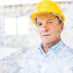 Senior architect or civil engineer on the construction site.